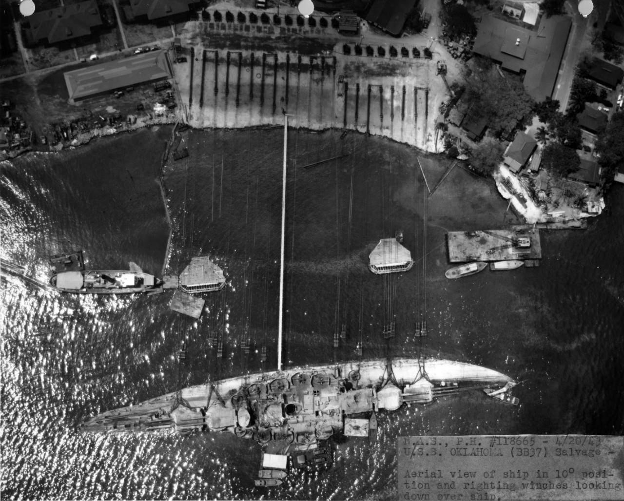 Aerial view of the salvage of the Oklahoma at Pearl Harbor