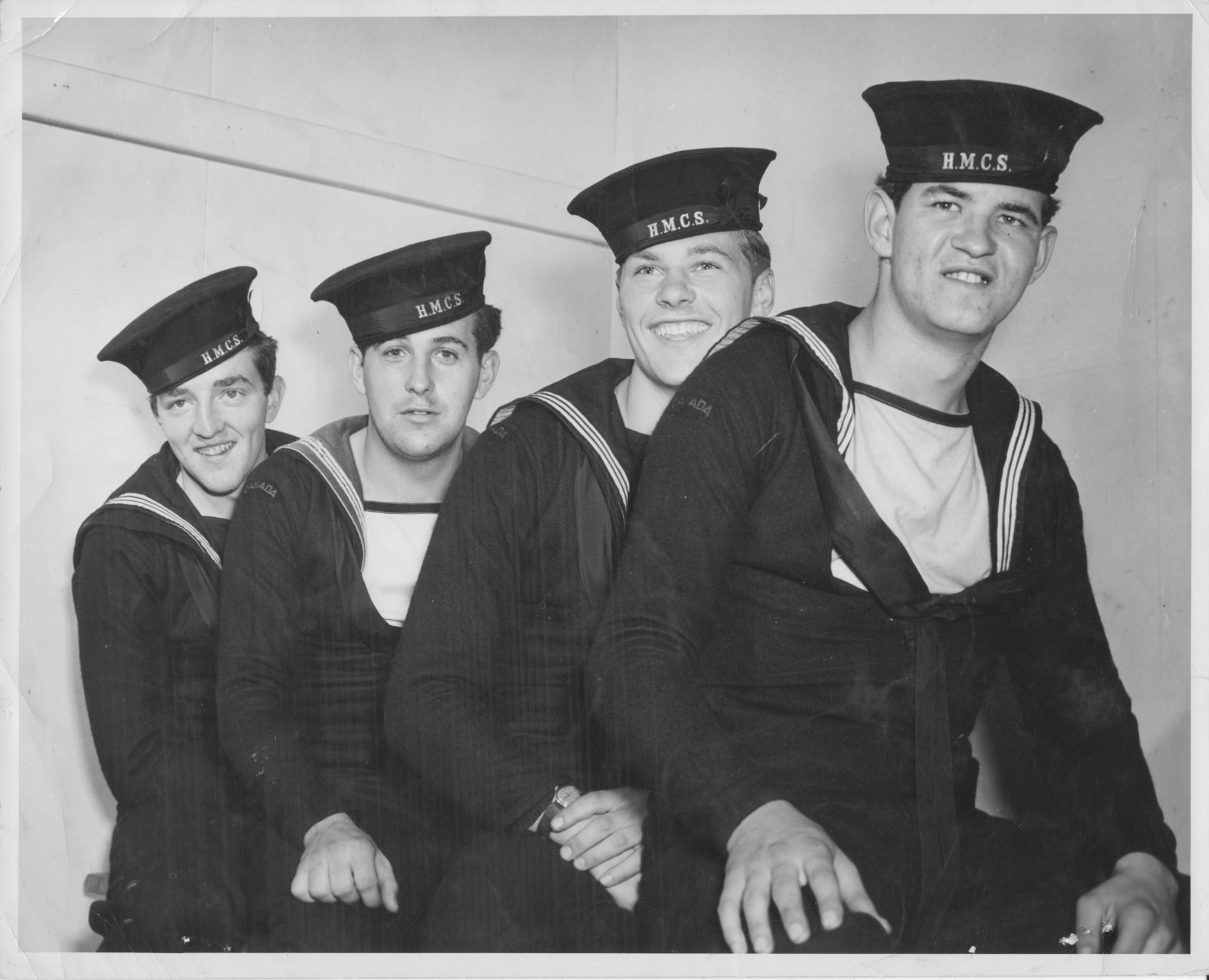 Four survivors from the sinking of the HMCS Regina (K-234)